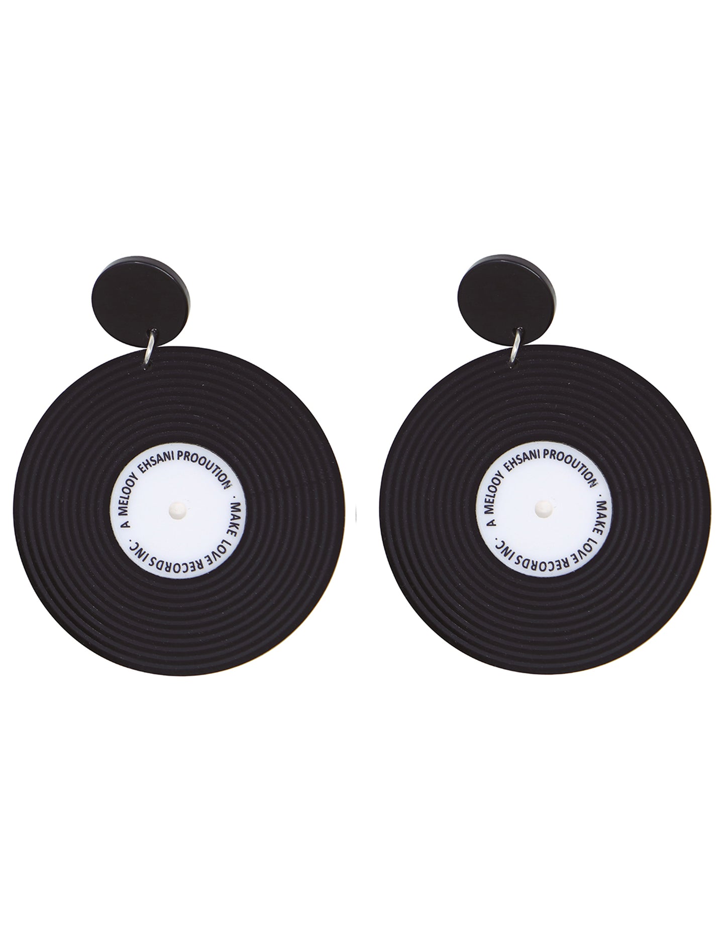 Gros plan sur la paire de boucles d'oreilles disques vinyles rétro