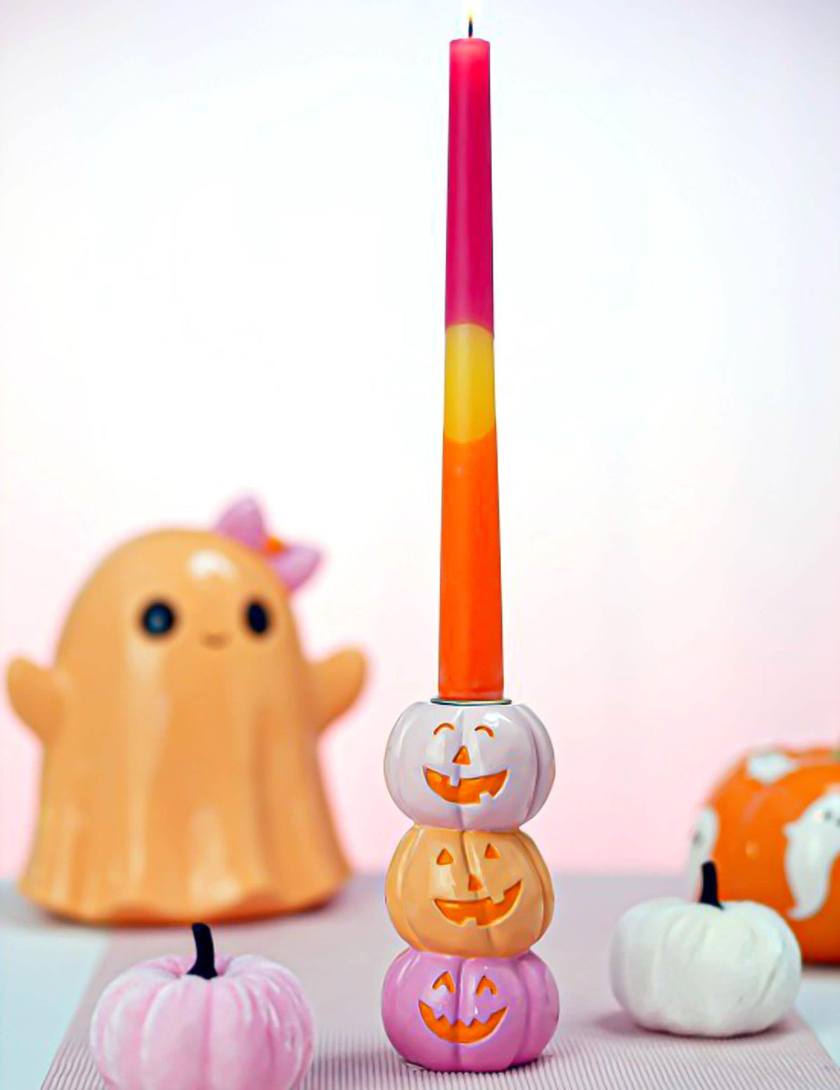 Bougeoir en résine avec 3 citrouilles souriantes 13 cm