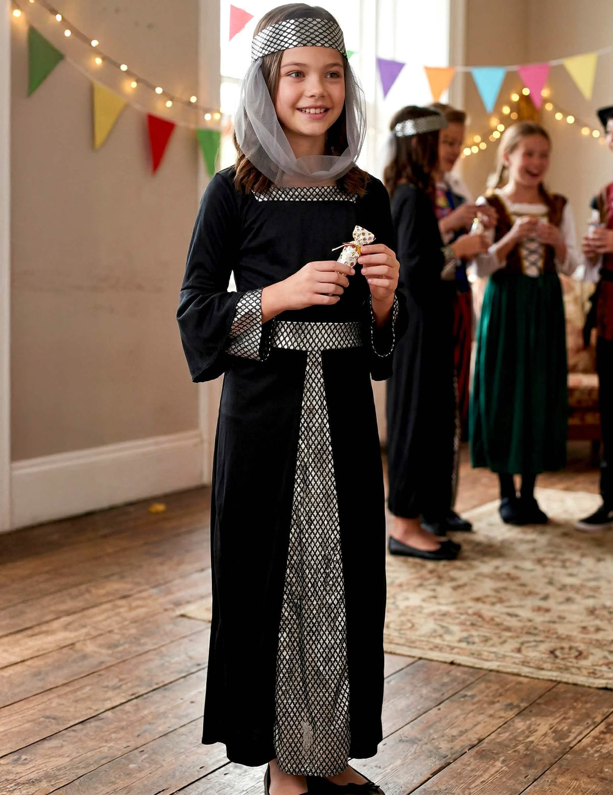 Punere în scenă a costumului de prințesă medievală pentru fată