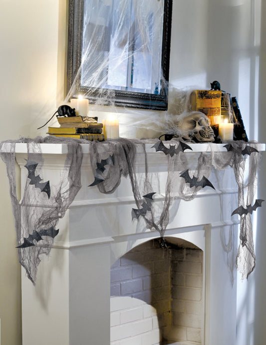 Mise en situation sur une cheminée du drap chauve-souris