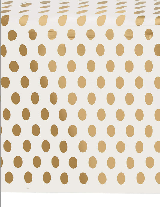 Détail du motif de la nappe en plastique à pois dorés pour fête et anniversaire
