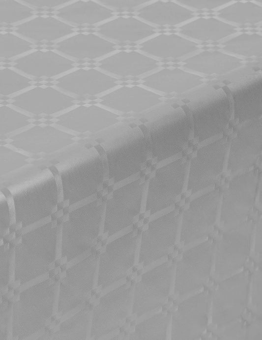 Détail des motifs damassés de la nappe en rouleau papier damassé pour fête