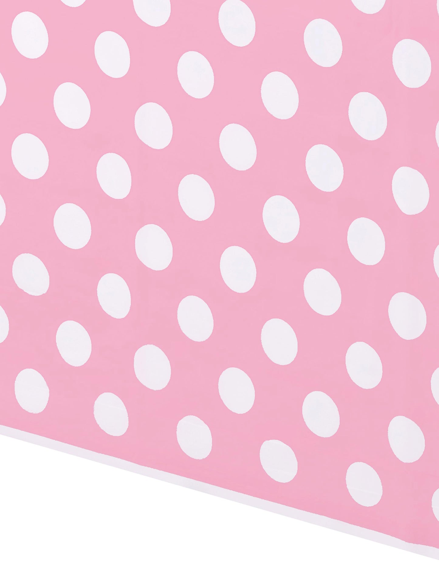 Détail du motif de la nappe décoration rétro rose à pois blancs en plastique