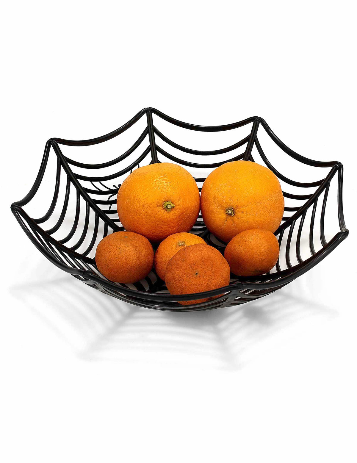 Mise în scenă cu fructe din bolul de salată, pânză de păianjen pentru halloween