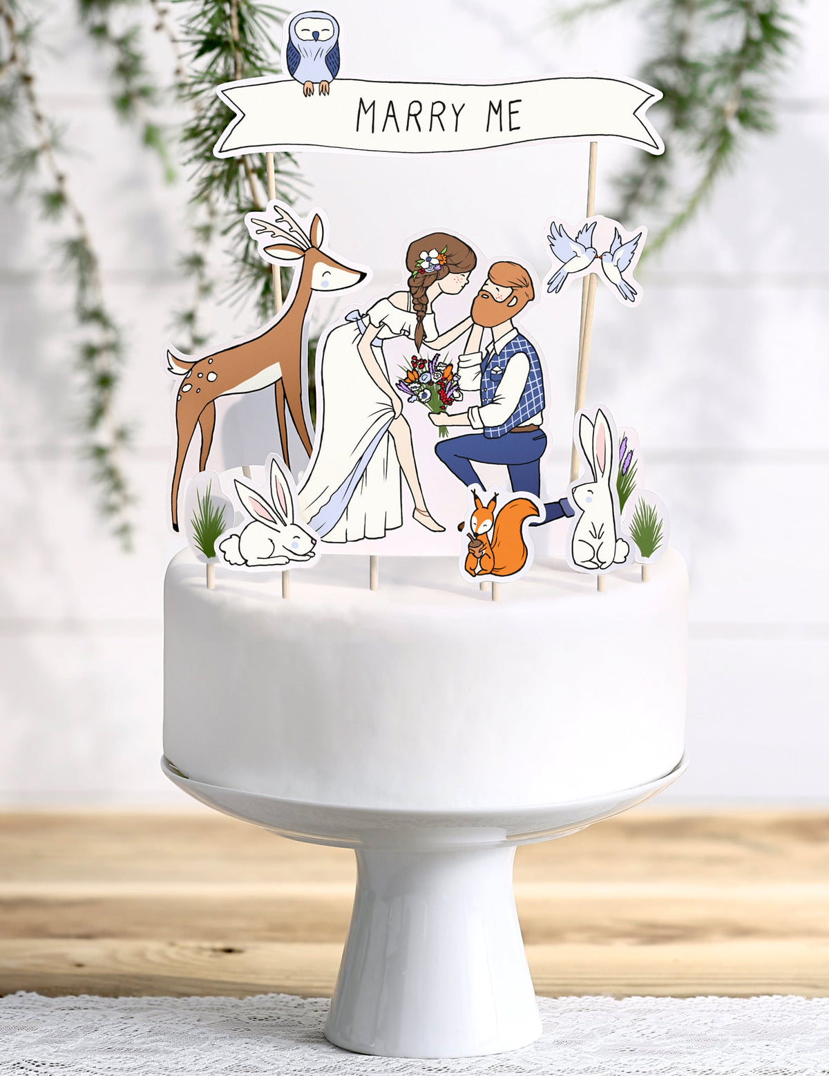 Mise en situation sur un gâteau des pics à gâteaux mariés nature décor champêtre