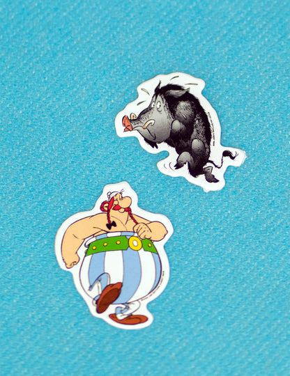 Détail illustrant Obélix et un sanglier des confettis de table Astérix