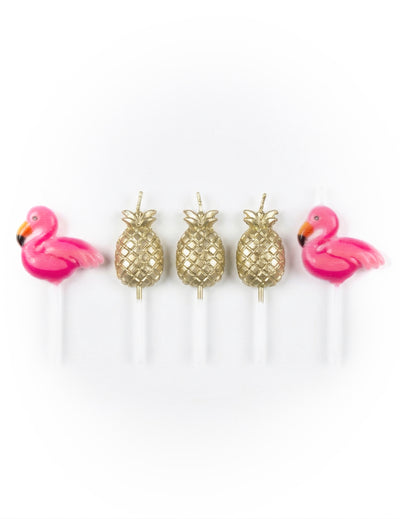 Bougies sur pic flamant rose et ananas pour gâteau rose et doré