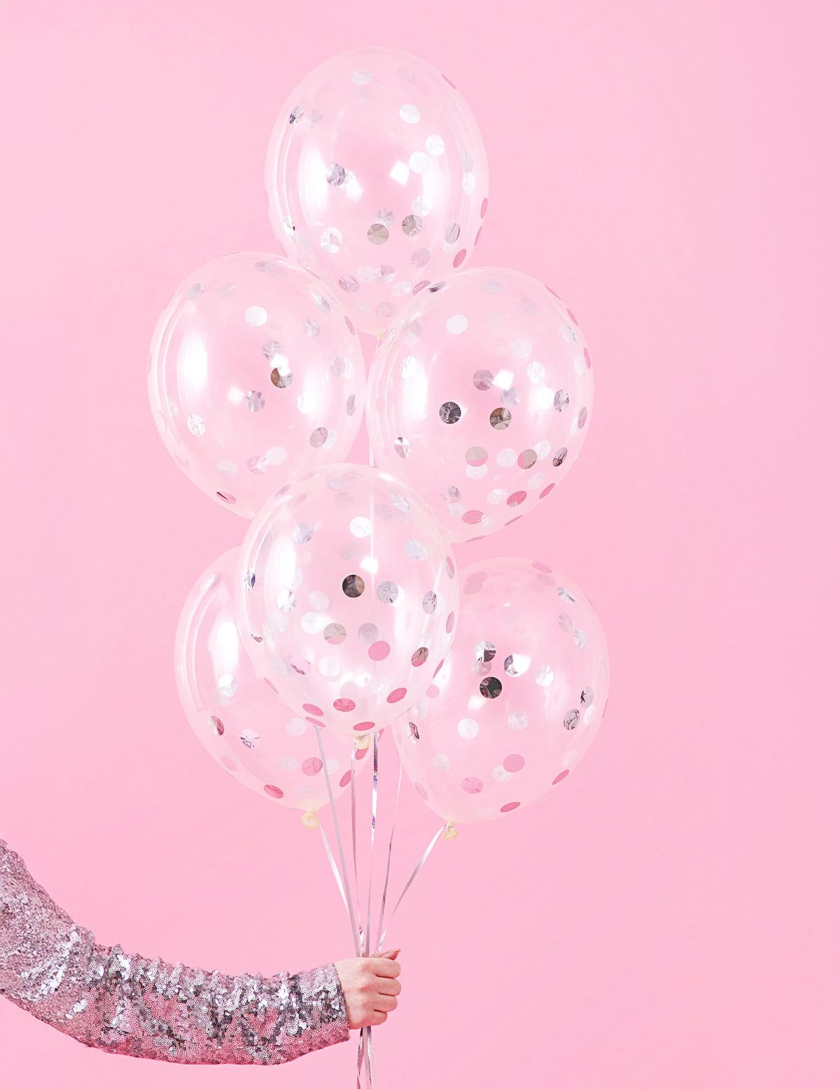 Grappe de ballons transparents confettis argentés pour fête