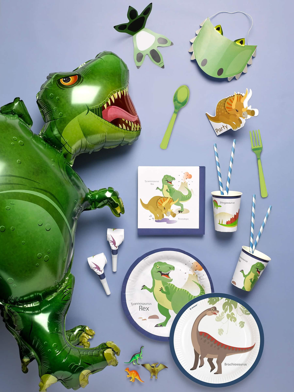 Mise în scenă cu accesorii de șapcă de petrecere mari dinozauri