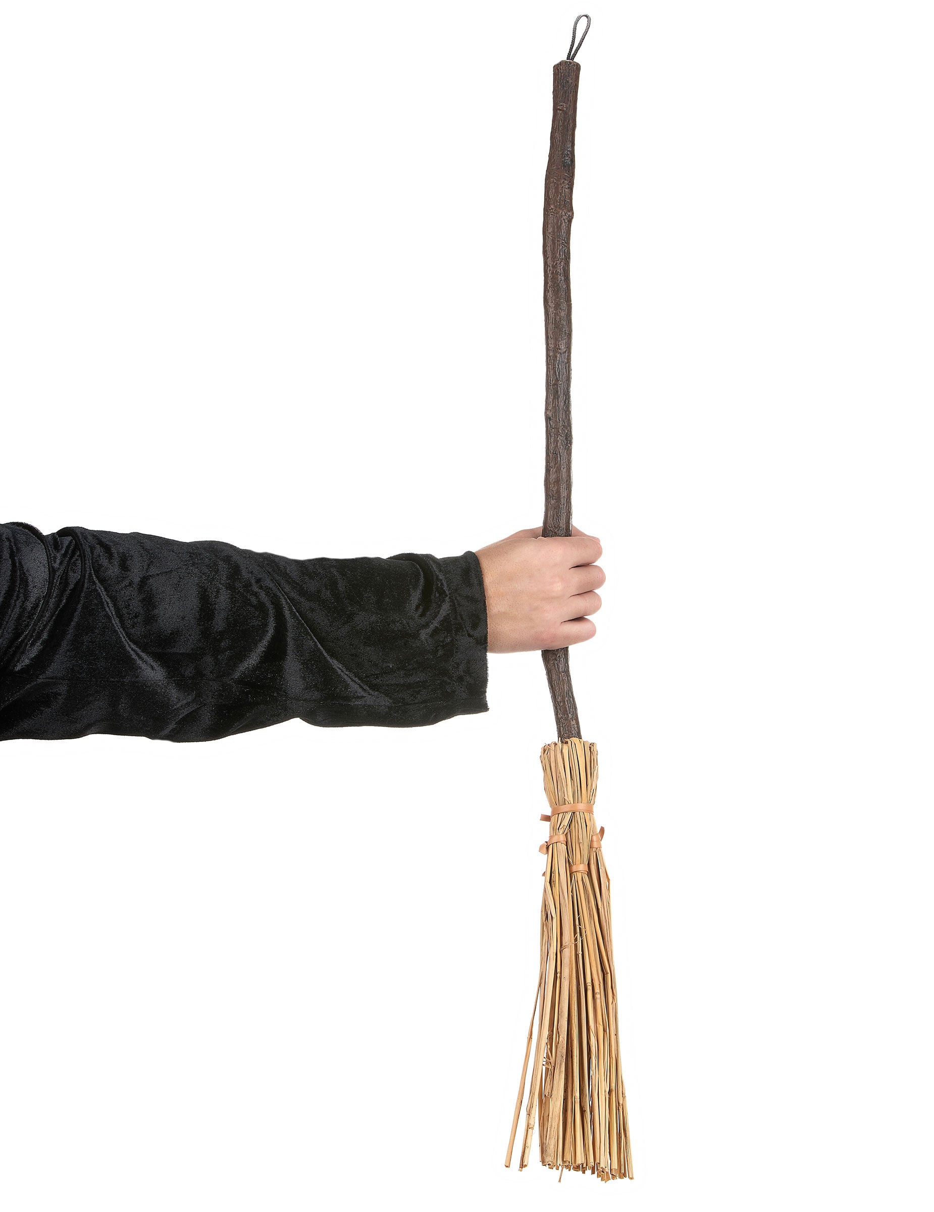 Mise en situation du balai de sorcière tenu par une main