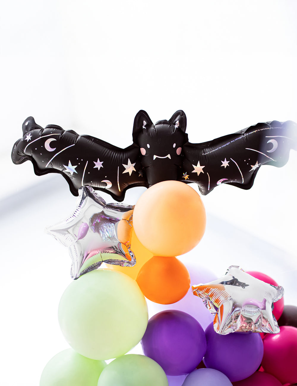 Ballon aluminium petite chauve-souris pour fête noir avec motifs étoiles et lunes