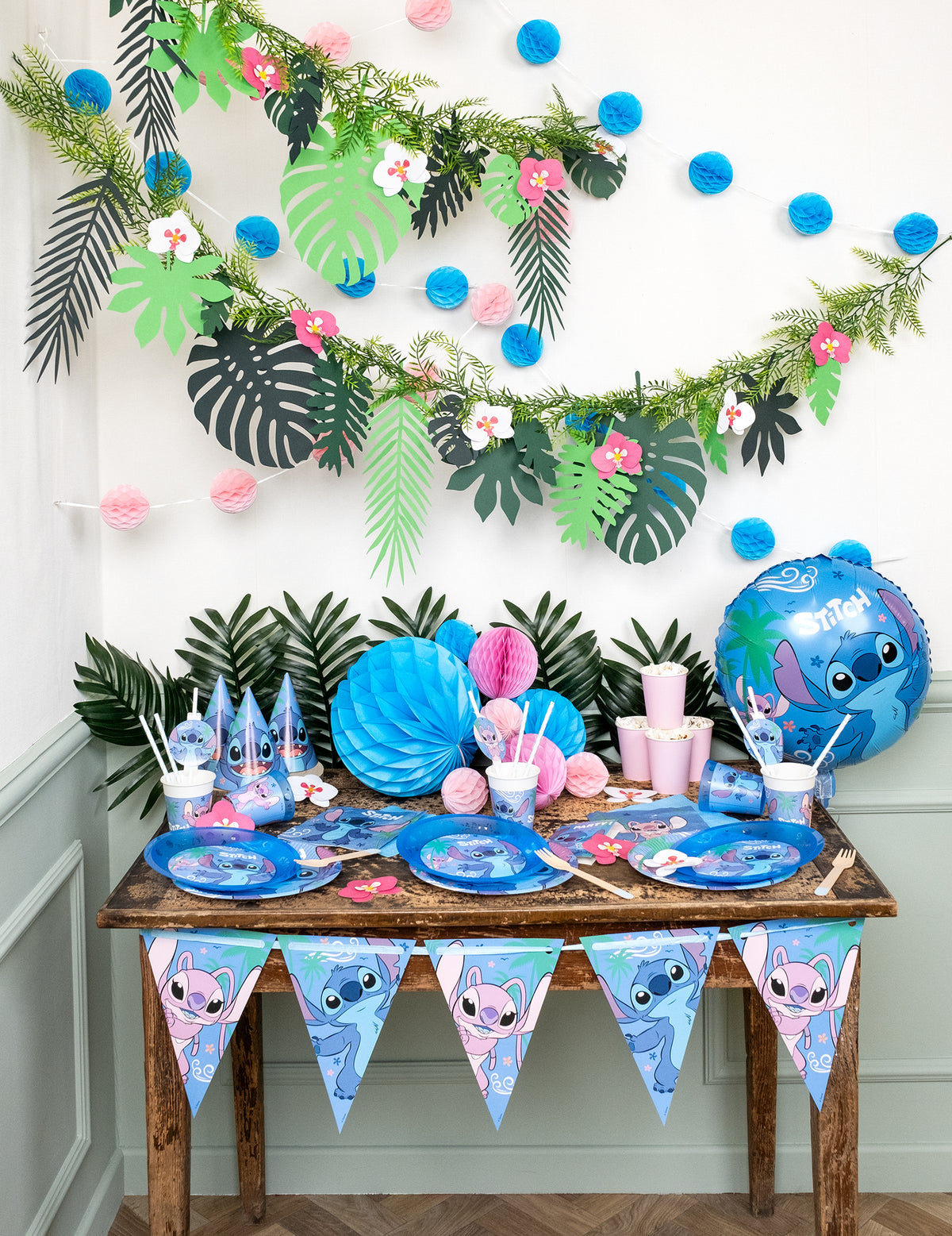 Table de fête décorée du ballon aluminium rond Stitch™