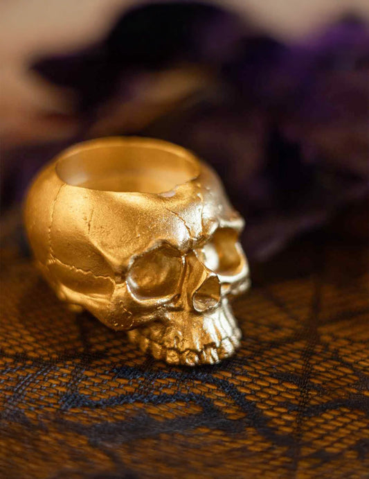 Sfeșnic craniu din rășină aurie 8 x 6 cm