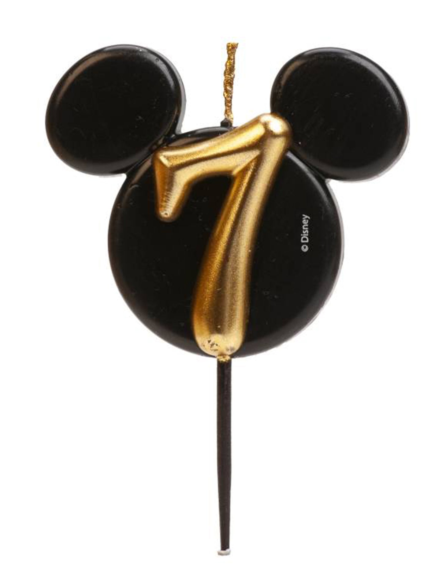 Gros plan sur le chiffre 7 doré de la bougie chiffre Mickey Mouse