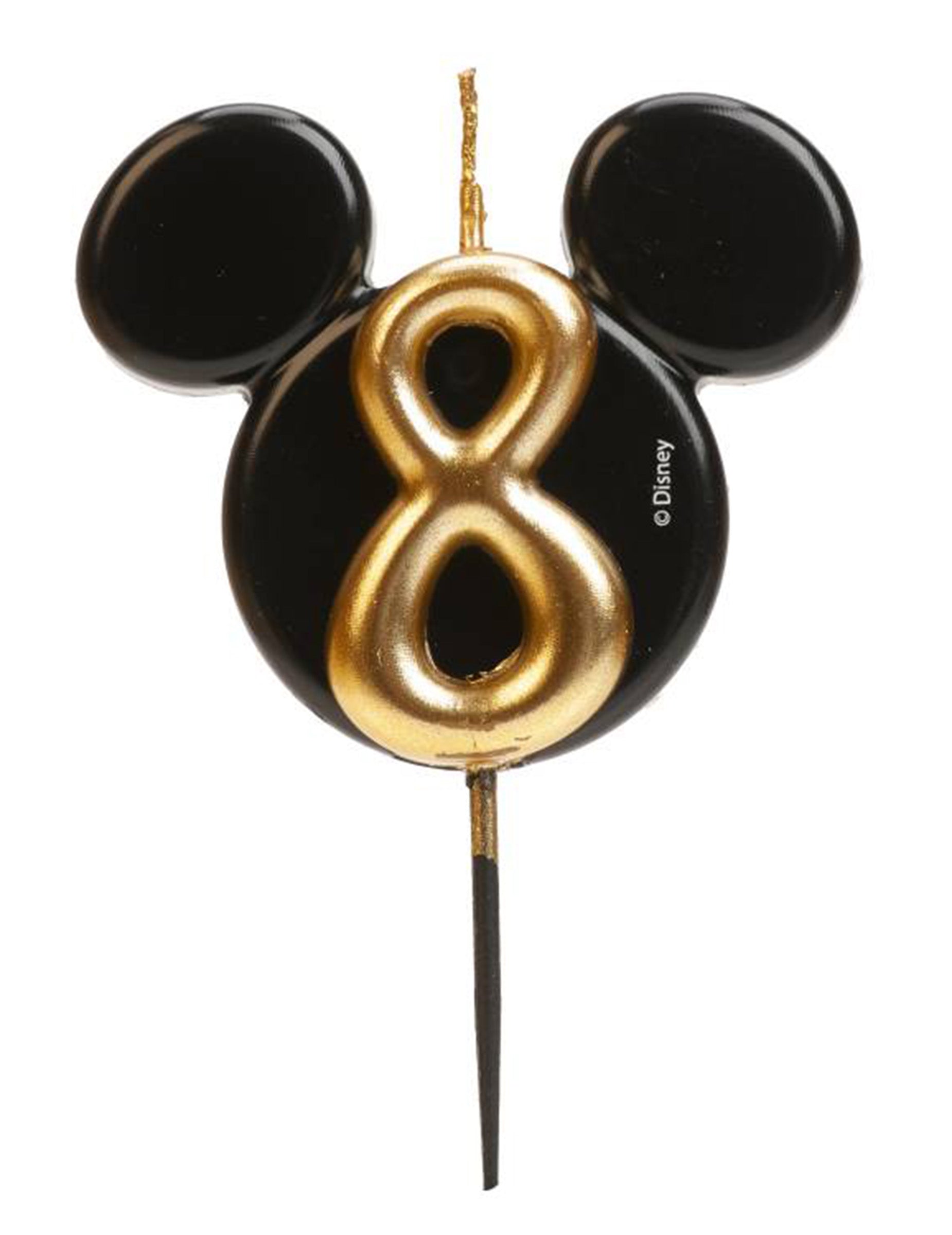 Gros plan sur le chiffre 8 doré de la bougie chiffre Mickey Mouse