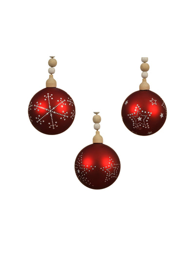 Boule de noël en verre rouge à motifs blancs et perles