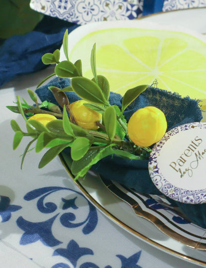 Détail de la branche de citrons et feuillage jaune et vert artificielle