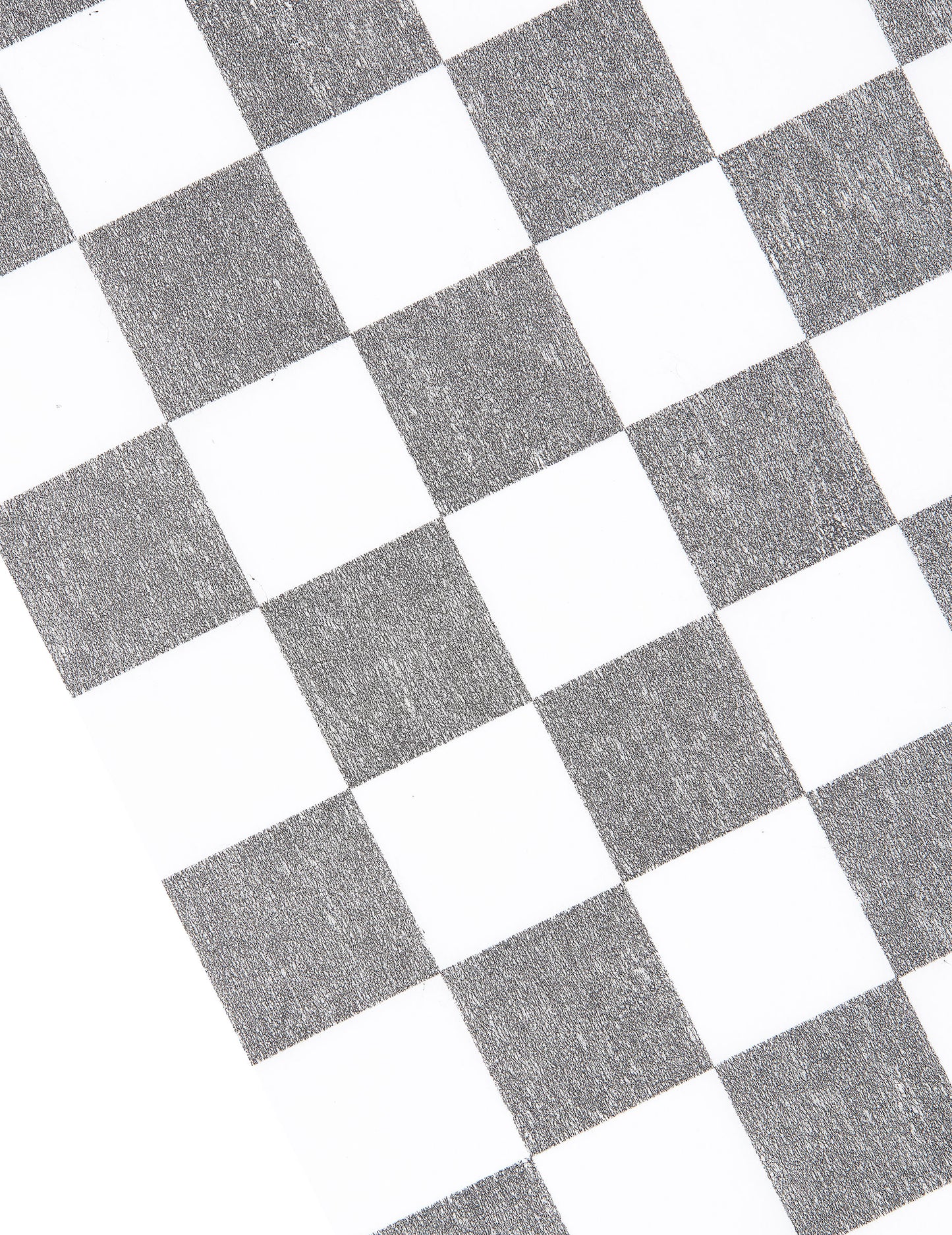 Détail du motif du chemin de table intissé damier