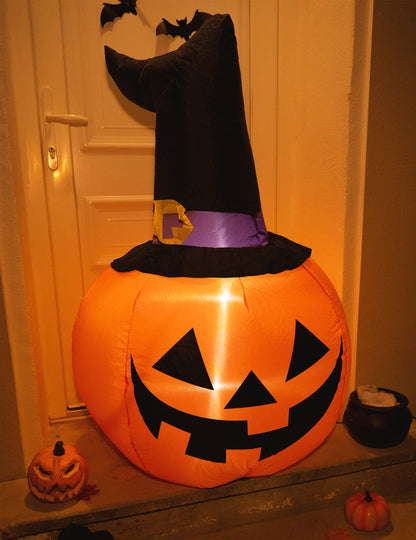 Mise en situation devant une porte de la citrouille gonflable lumineuse Halloween