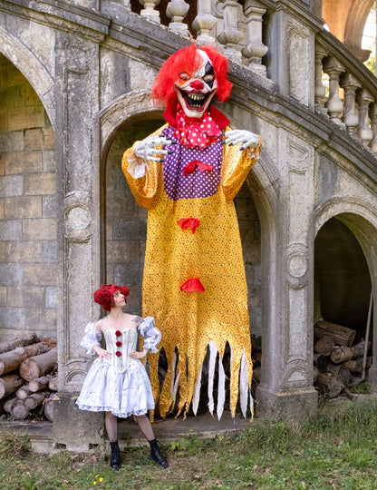 Décoration Halloween géante clown terrifiant suspendu jaune et violet à pois rouges