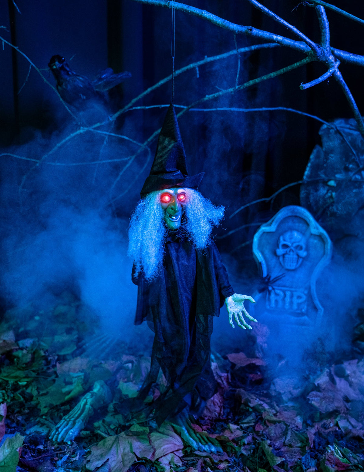 Décoration de sorcière animée lumineuse et parlante pour Halloween noire et verte avec yeux rouges