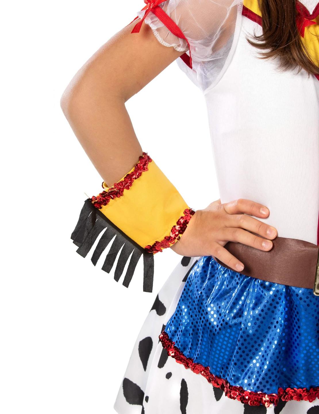 Detaliu al manșetei cu franjuri și paiete a costumului de cowgirl desen animat