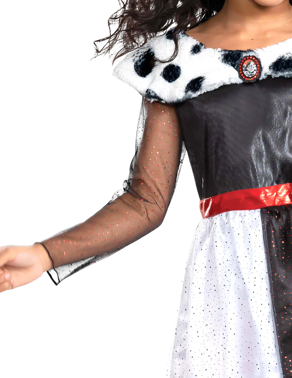 Détail de la manche en tulle noir à paillettes rouges du déguisement Cruella classique pour fille