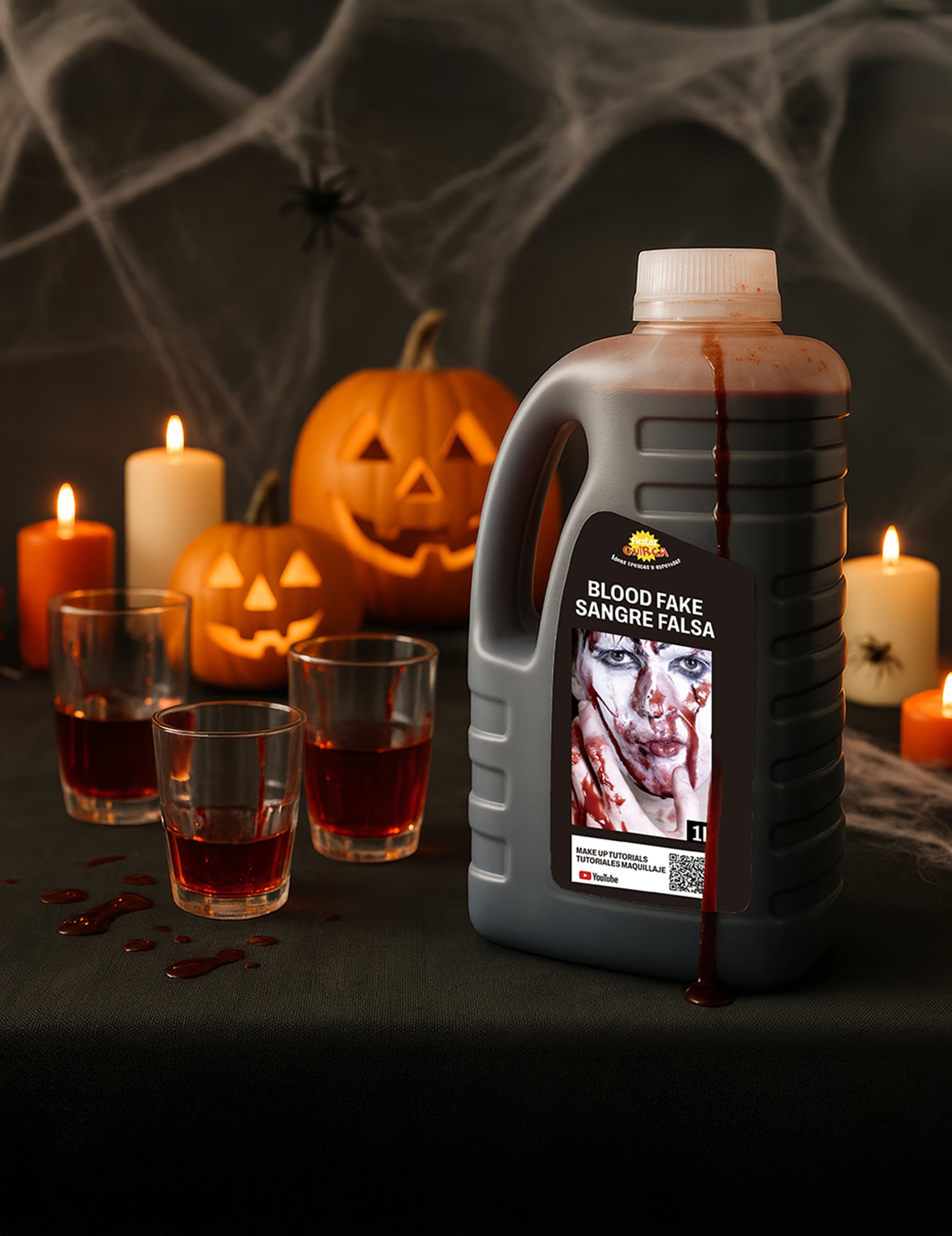 Mise en scène avec citrouilles et bougies du faux sang Halloween pour adulte rouge liquide