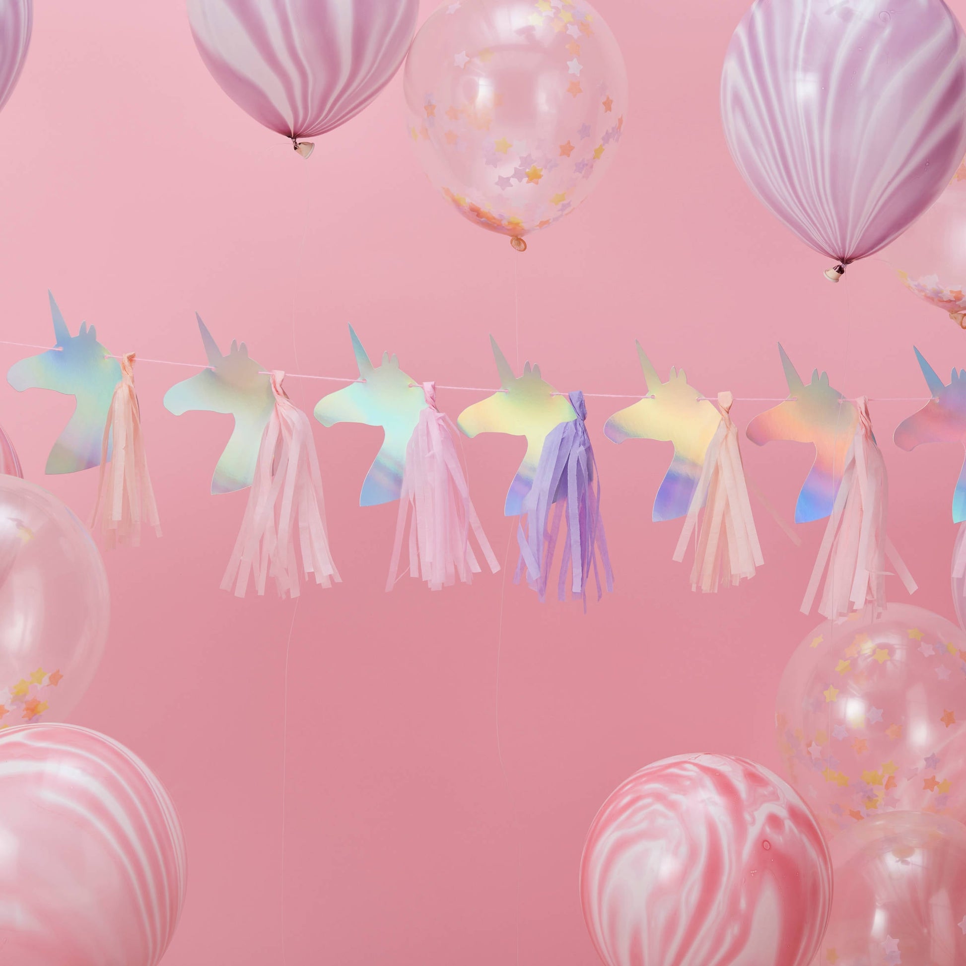Guirlande en papier et tassel Licorne pour fête iridescente avec pompons roses et violets