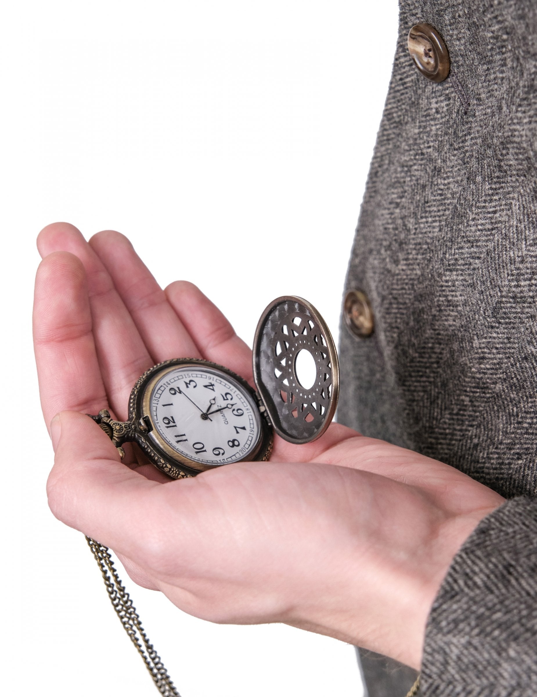 Prim-plan cu ceasul de buzunar deschis din kitul de accesorii anii 20
