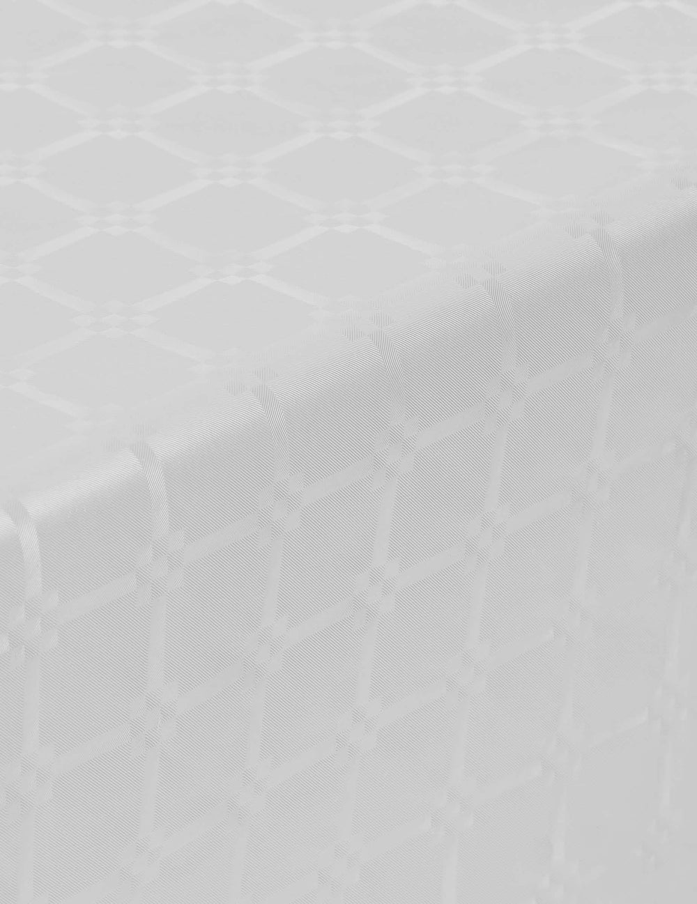Détail du motif damassé de la nappe en rouleau papier damassé blanche