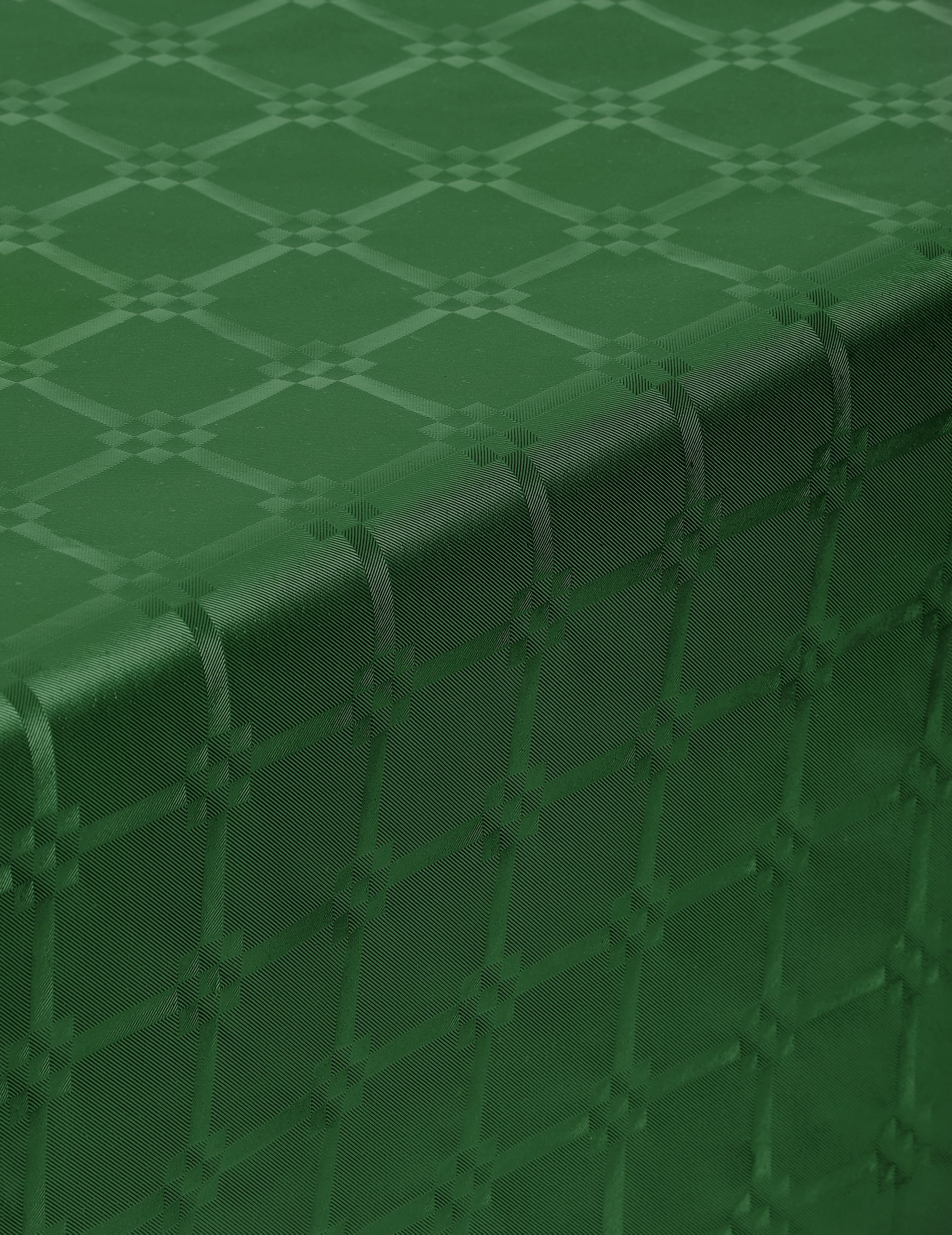 Détail de la texture damassée de la nappe en rouleau papier damassé pour fête vert foncé