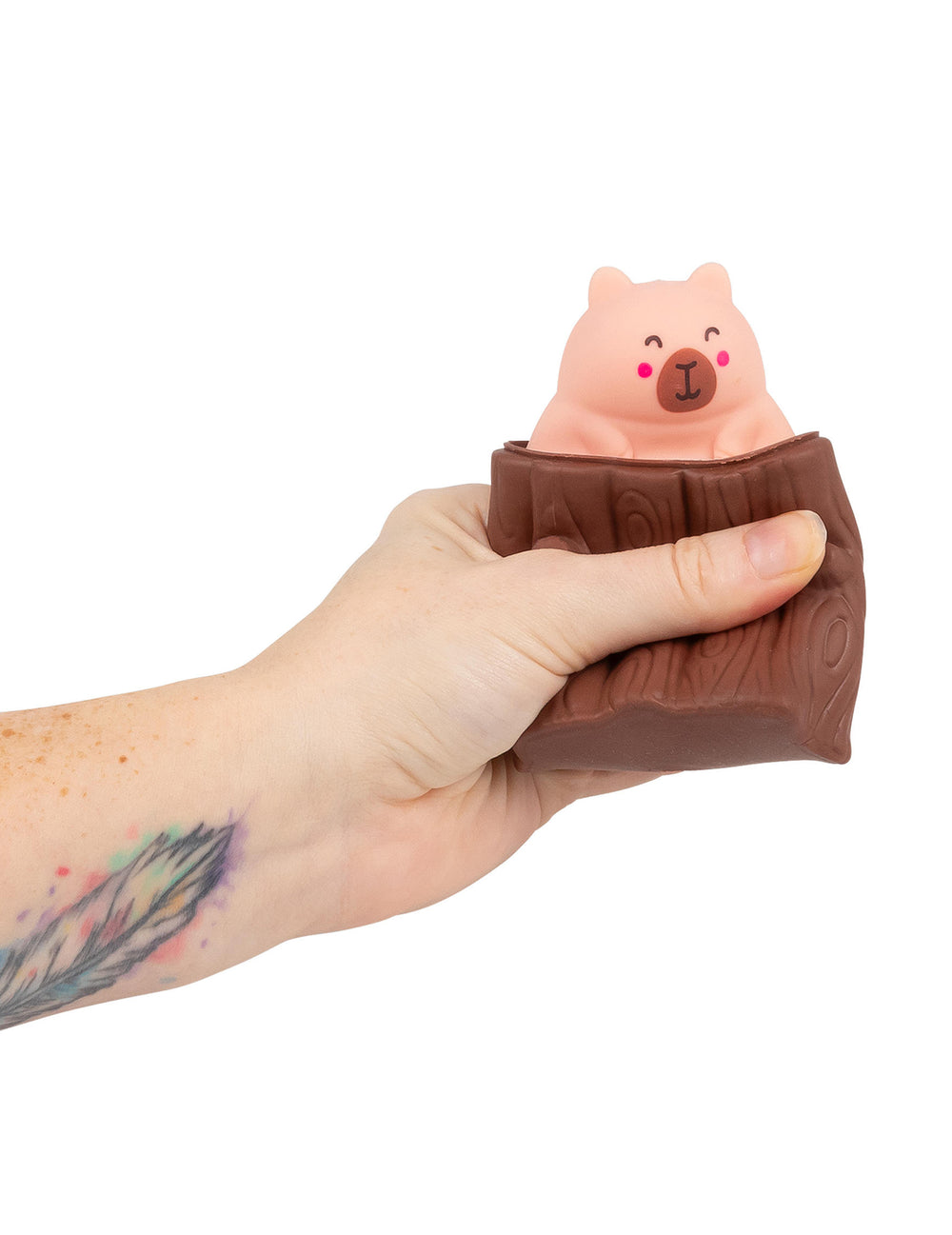 Action de presser pour faire apparaître le personnage du Jouet Pop Up Capybara