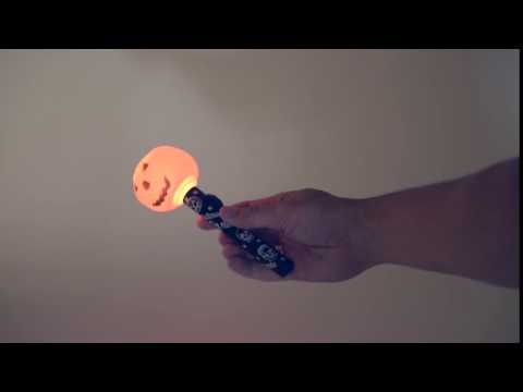 Lampe torche citrouille orange manche décorés Halloween