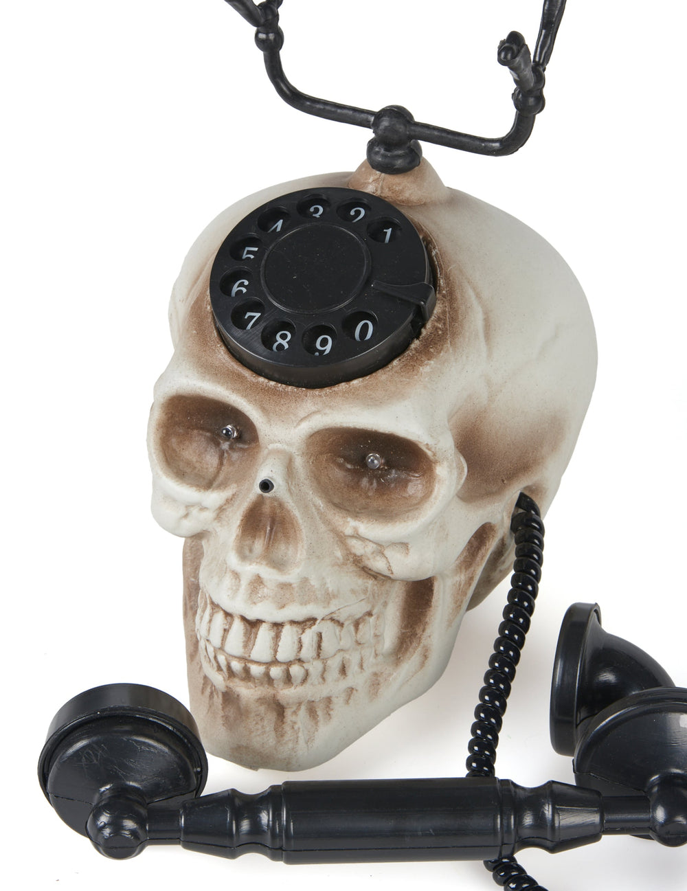 Vue de face et détail du cadran du téléphone tête de mort